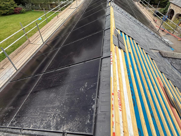In-roof BIPV solar tiles integrated into building roofline
